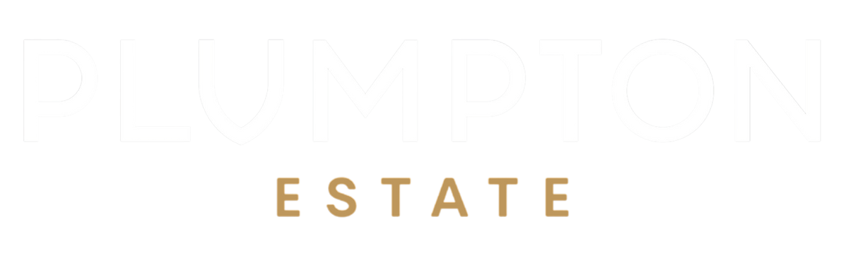 A minimalist graphic featuring the word 'PLUMPTON' in a very light gray serif font at the top, with 'ESTATE' centered below in a warm tan/gold serif font, all on a solid white background.